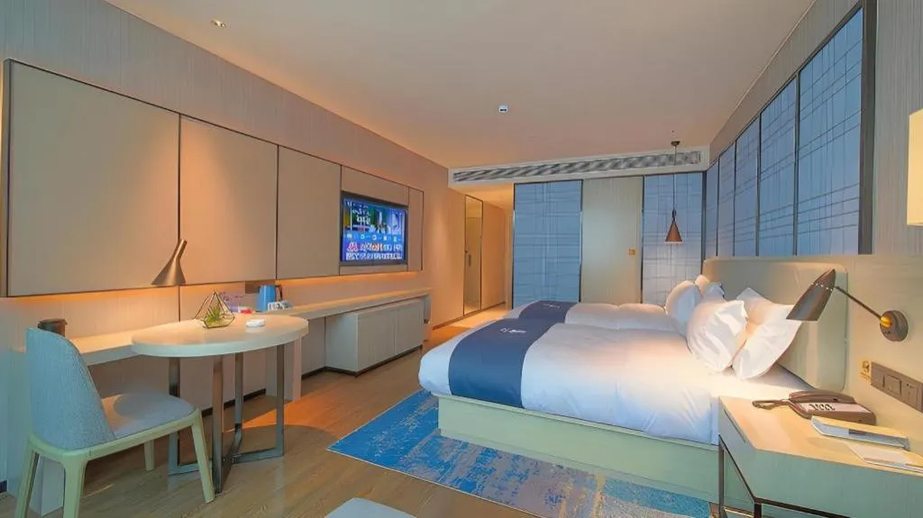 Bed in Echarm Hotel Guangzhou Changlong Shiqiao Metro Station