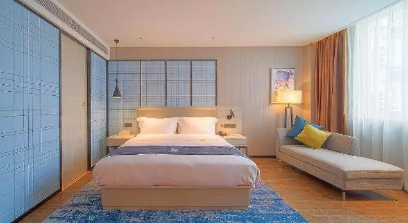 Bed in Echarm Hotel Guangzhou Changlong Shiqiao Metro Station