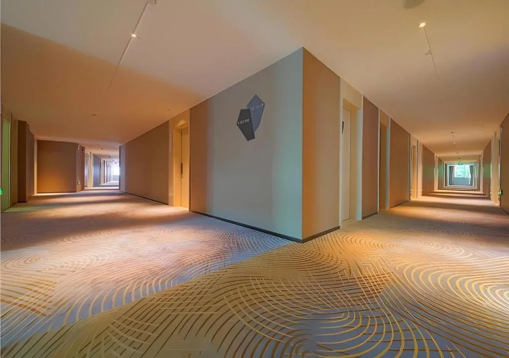 Bed in Echarm Hotel Guangzhou Changlong Shiqiao Metro Station