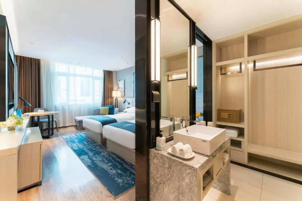 Bed in Echarm Hotel Guangzhou Changlong Shiqiao Metro Station