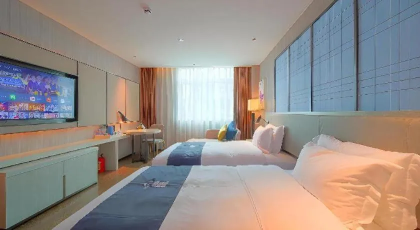 Bed in Echarm Hotel Guangzhou Changlong Shiqiao Metro Station