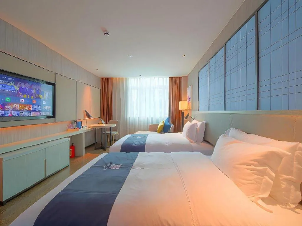 Bed in Echarm Hotel Guangzhou Changlong Shiqiao Metro Station