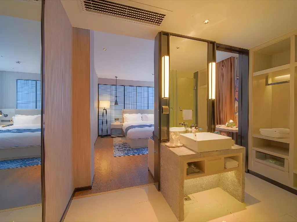 Bed in Echarm Hotel Guangzhou Changlong Shiqiao Metro Station