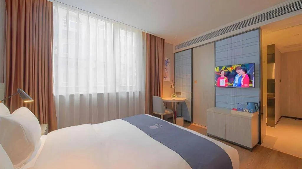 Bed in Echarm Hotel Guangzhou Changlong Shiqiao Metro Station