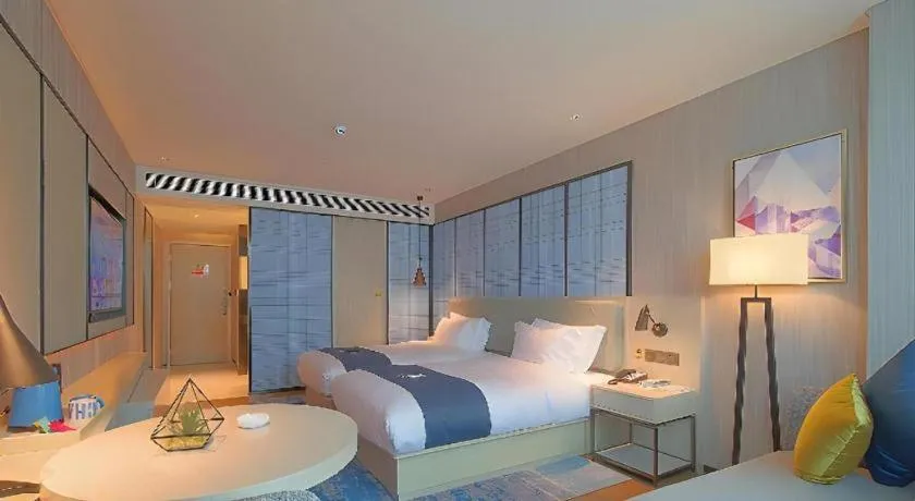 Bed in Echarm Hotel Guangzhou Changlong Shiqiao Metro Station