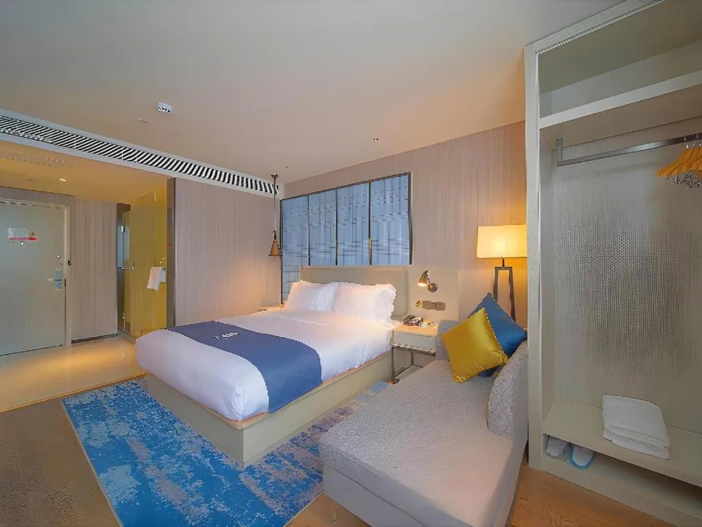 Bed in Echarm Hotel Guangzhou Changlong Shiqiao Metro Station
