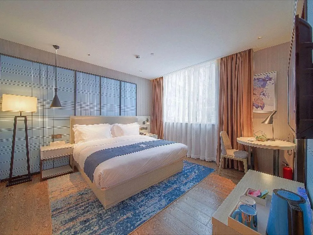 Bed in Echarm Hotel Guangzhou Changlong Shiqiao Metro Station