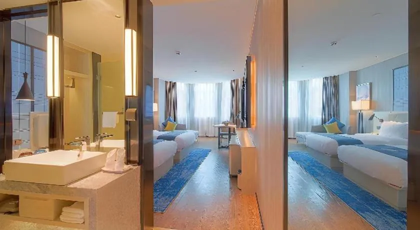 Bed in Echarm Hotel Guangzhou Changlong Shiqiao Metro Station