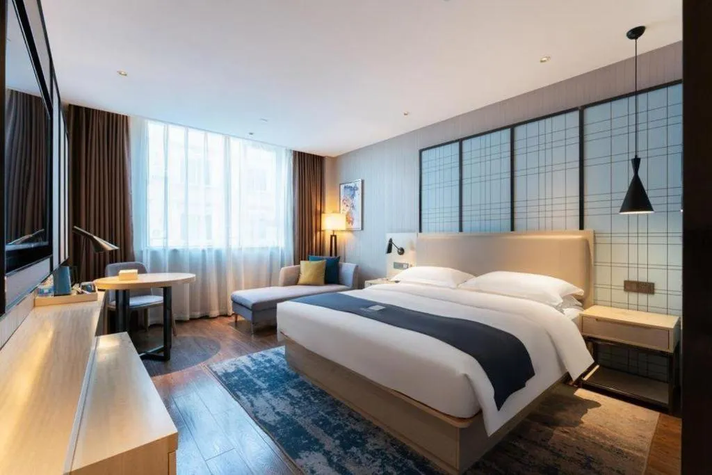 Bed in Echarm Hotel Guangzhou Changlong Shiqiao Metro Station