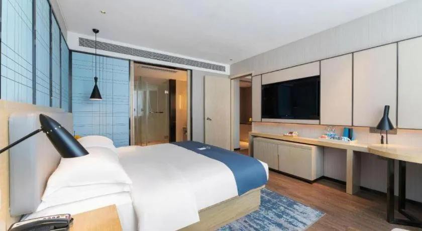 Bed in Echarm Hotel Guangzhou Changlong Shiqiao Metro Station