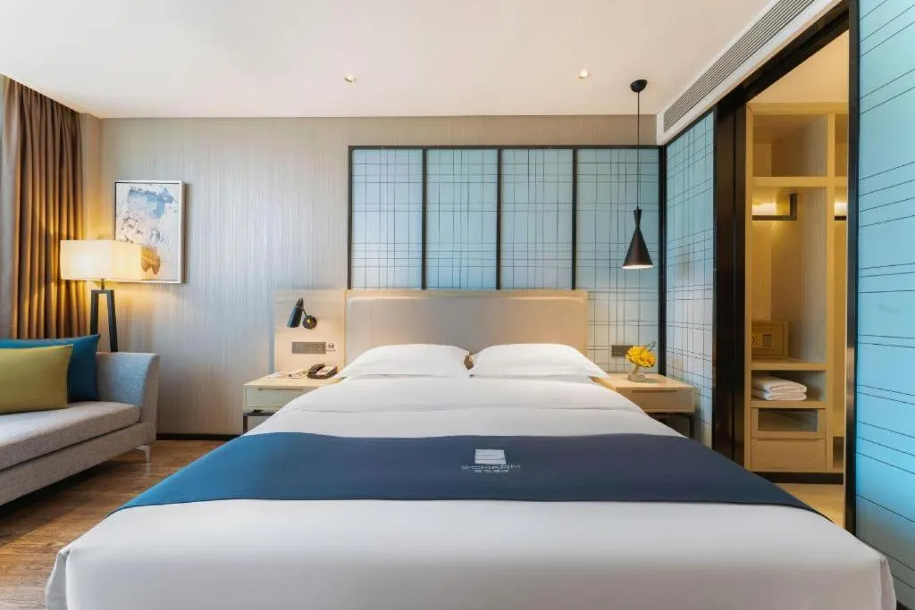 Bed in Echarm Hotel Guangzhou Changlong Shiqiao Metro Station