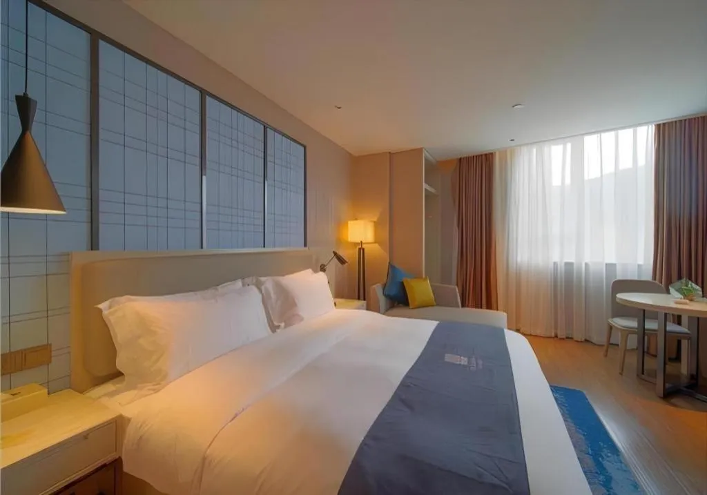 Bed in Echarm Hotel Guangzhou Changlong Shiqiao Metro Station