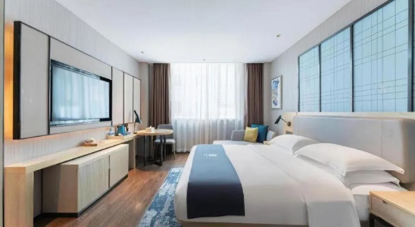 Bed in Echarm Hotel Guangzhou Changlong Shiqiao Metro Station