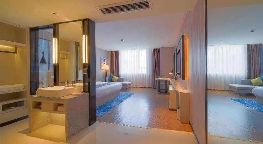 Bed in Echarm Hotel Guangzhou Changlong Shiqiao Metro Station