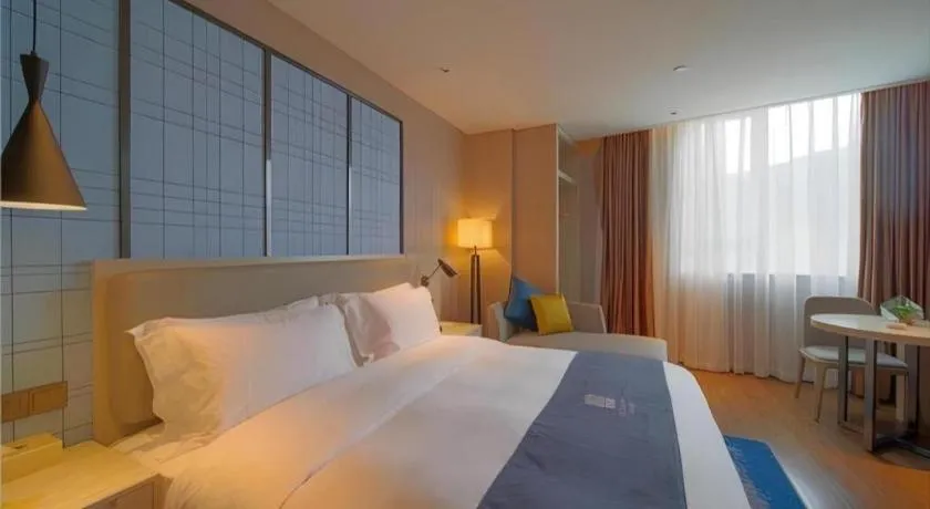 Bed in Echarm Hotel Guangzhou Changlong Shiqiao Metro Station