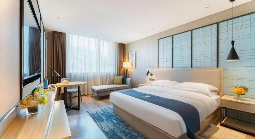 Bed in Echarm Hotel Guangzhou Changlong Shiqiao Metro Station