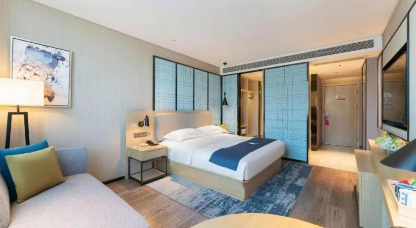 Bed in Echarm Hotel Guangzhou Changlong Shiqiao Metro Station