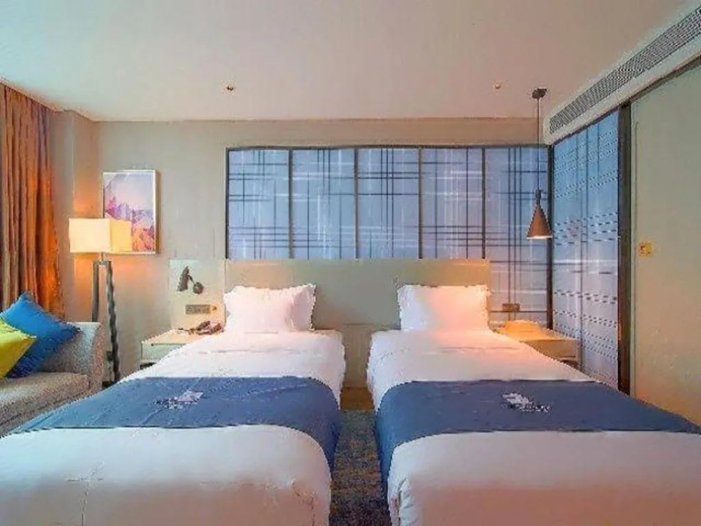 Bed in Echarm Hotel Guangzhou Changlong Shiqiao Metro Station