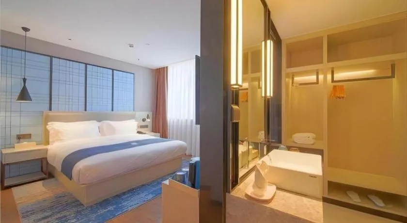 Bed in Echarm Hotel Guangzhou Changlong Shiqiao Metro Station