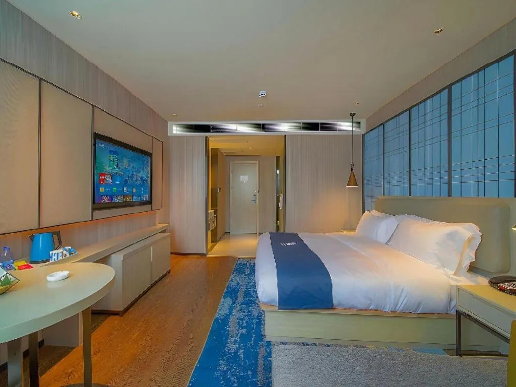 Bed in Echarm Hotel Guangzhou Changlong Shiqiao Metro Station