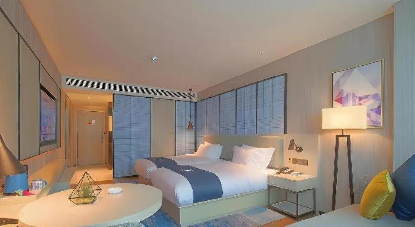 Bed in Echarm Hotel Guangzhou Changlong Shiqiao Metro Station