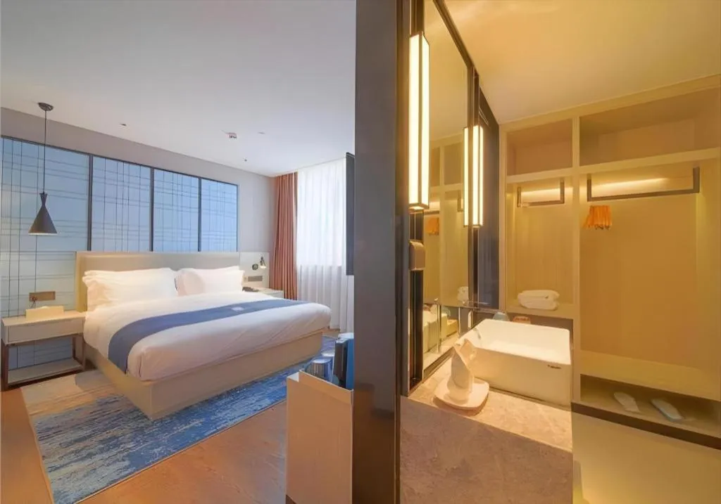 Bed in Echarm Hotel Guangzhou Changlong Shiqiao Metro Station