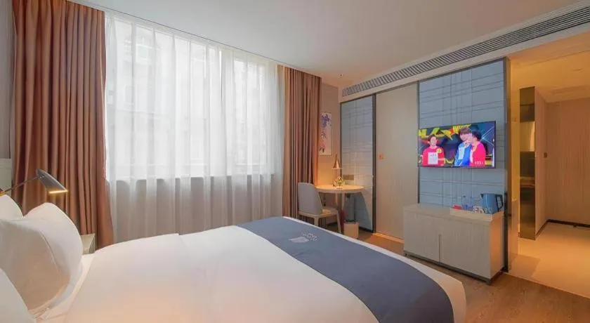 Bed in Echarm Hotel Guangzhou Changlong Shiqiao Metro Station