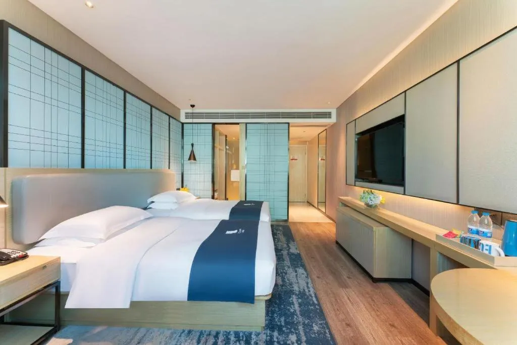 Bed in Echarm Hotel Guangzhou Changlong Shiqiao Metro Station