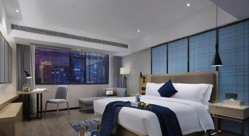 Bed in Echarm Hotel Guangzhou Tonghe Dayuan Times Square