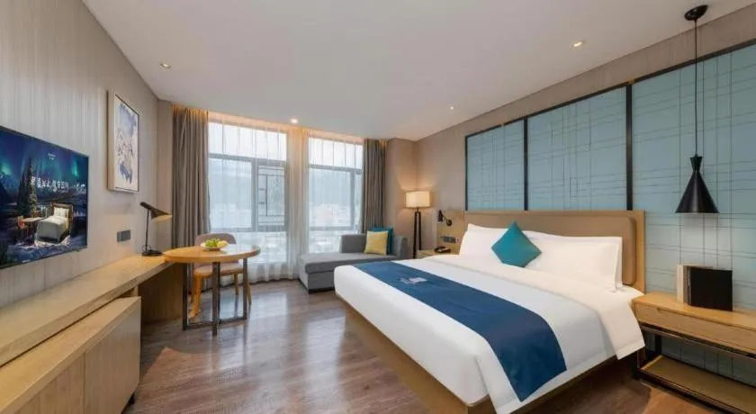 Bed in Echarm Hotel Guangzhou Tonghe Dayuan Times Square