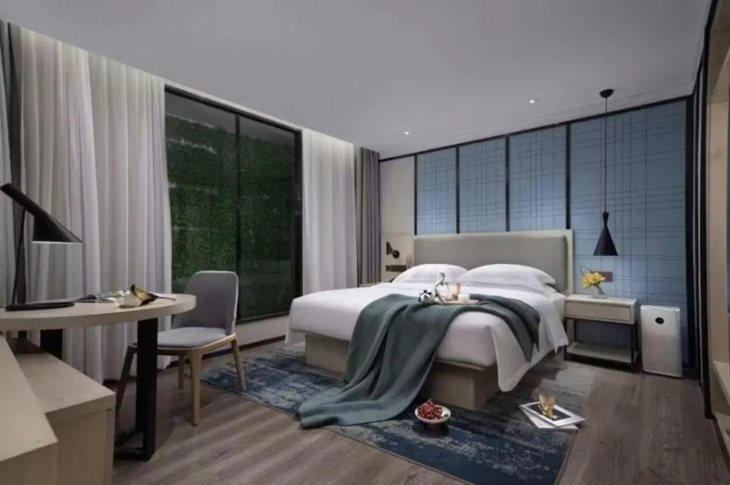 Bed in Echarm Hotel Guangzhou Tonghe Dayuan Times Square