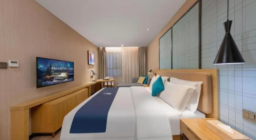 Bed in Echarm Hotel Guangzhou Tonghe Dayuan Times Square