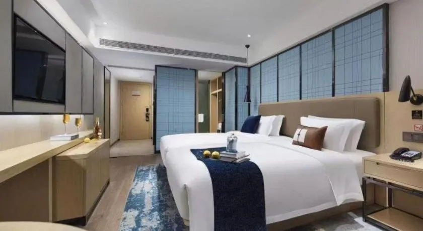 Bed in Echarm Hotel Guangzhou Tonghe Dayuan Times Square