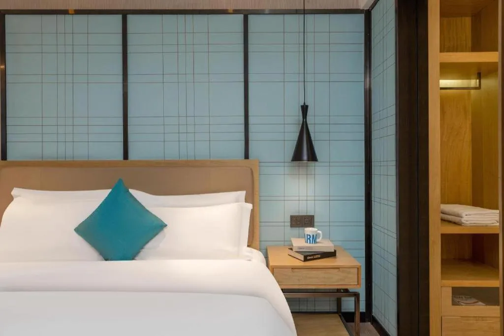 Bed in Echarm Hotel Guangzhou Tonghe Dayuan Times Square