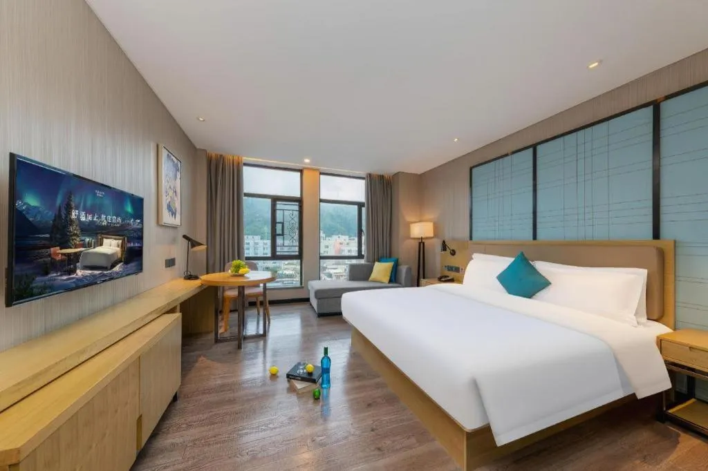 Bed in Echarm Hotel Guangzhou Tonghe Dayuan Times Square