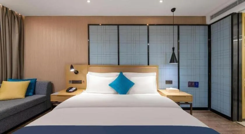 Bed in Echarm Hotel Guangzhou Tonghe Dayuan Times Square