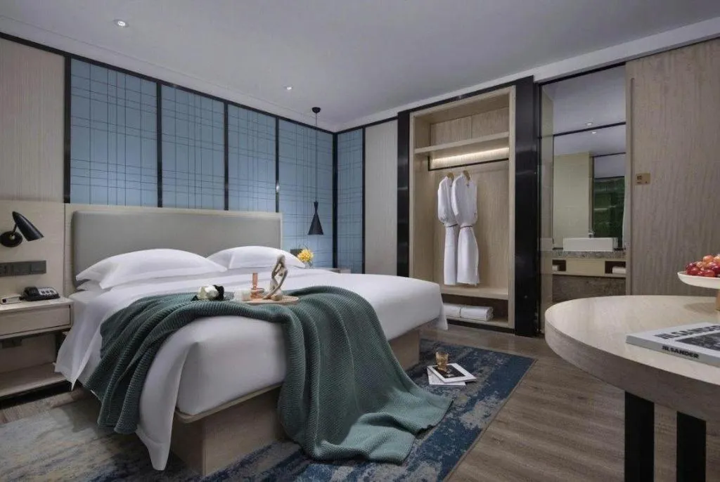 Bed in Echarm Hotel Guangzhou Tonghe Dayuan Times Square