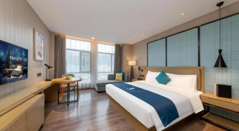 Bed in Echarm Hotel Guangzhou Tonghe Dayuan Times Square