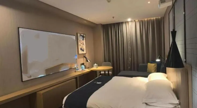 Bed in Echarm Hotel Guangzhou Tonghe Dayuan Times Square