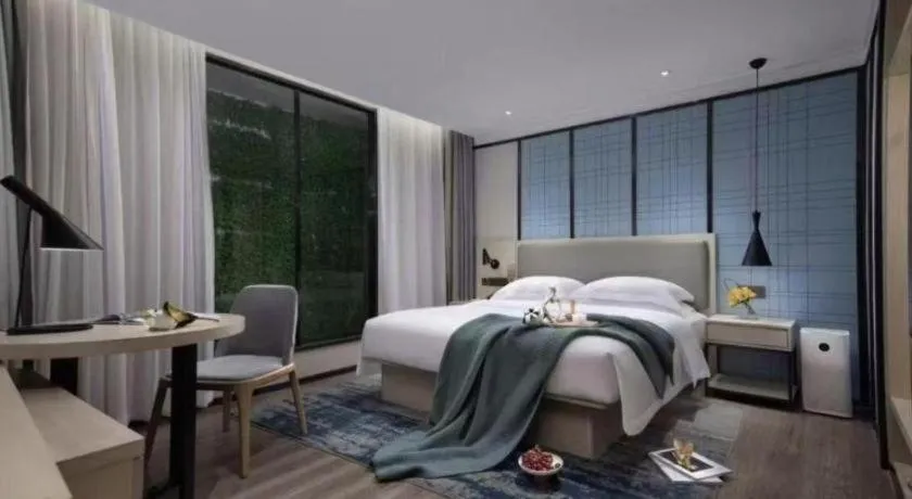 Bed in Echarm Hotel Guangzhou Tonghe Dayuan Times Square