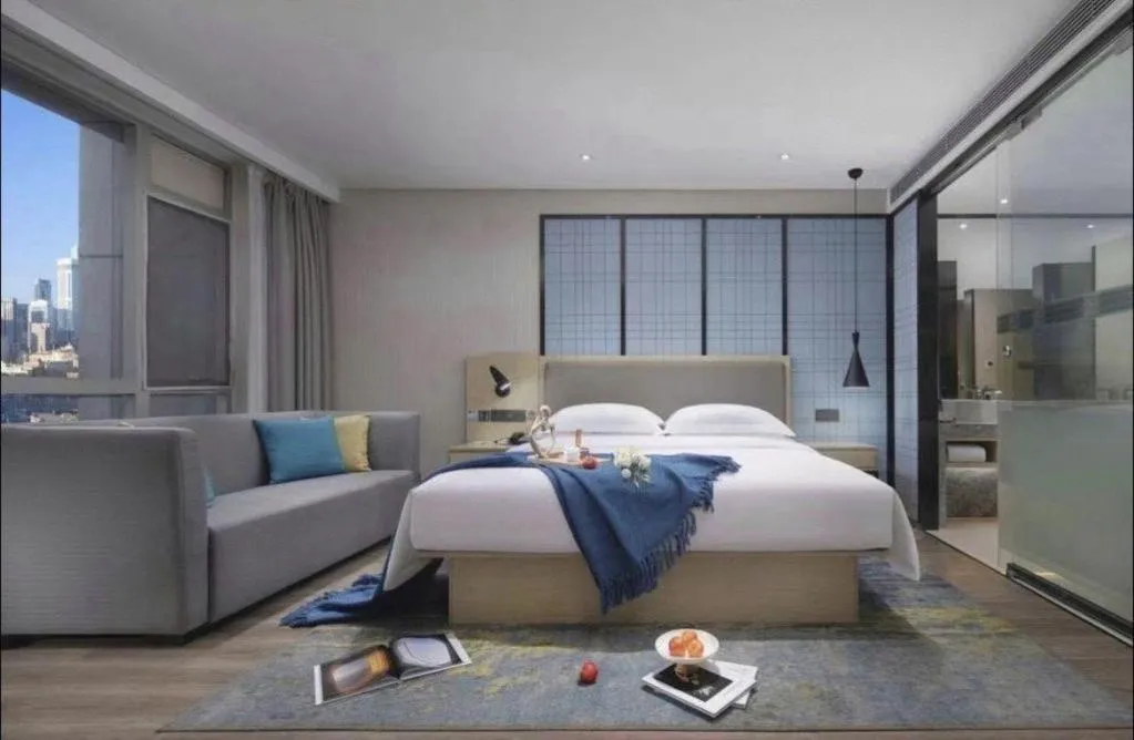 Bed in Echarm Hotel Guangzhou Tonghe Dayuan Times Square