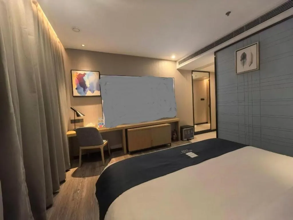 Bed in Echarm Hotel Guangzhou Tonghe Dayuan Times Square