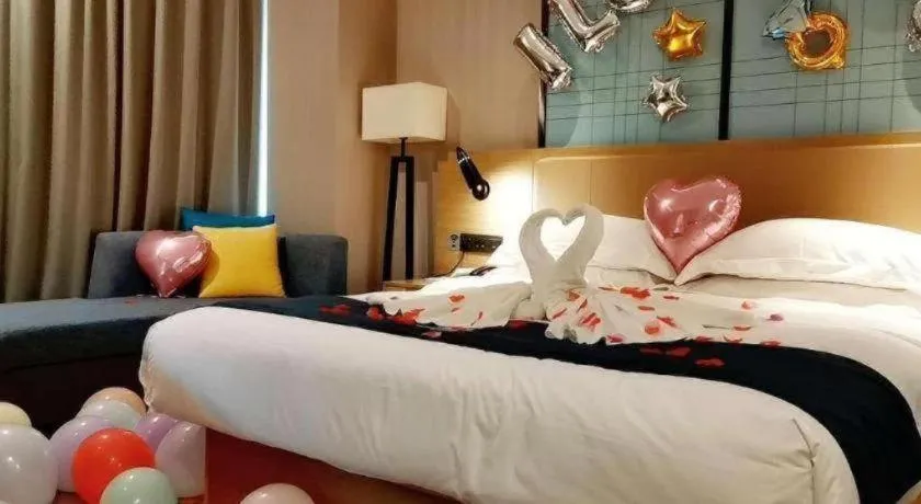 Bed in Echarm Hotel Guangzhou Tonghe Dayuan Times Square