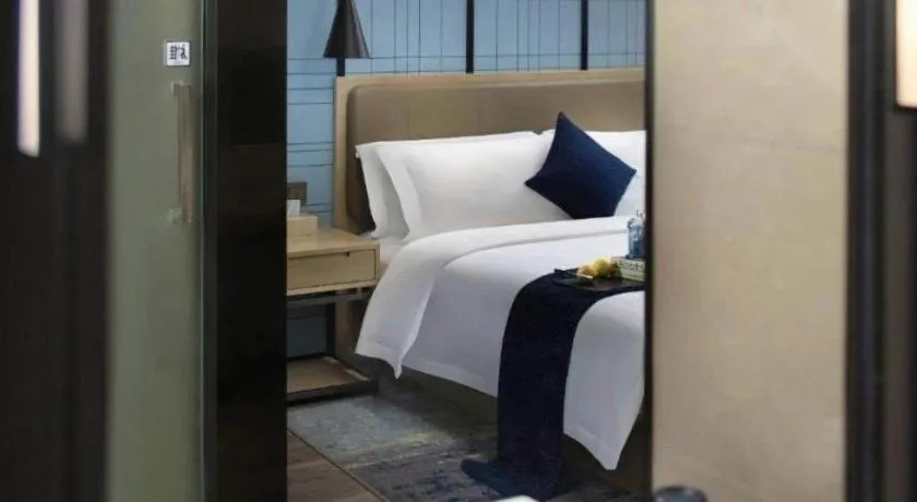 Bed in Echarm Hotel Guangzhou Tonghe Dayuan Times Square
