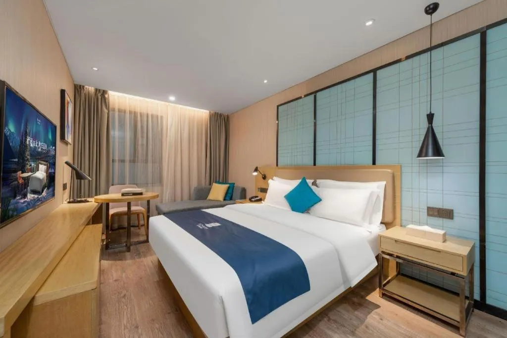 Bed in Echarm Hotel Guangzhou Tonghe Dayuan Times Square