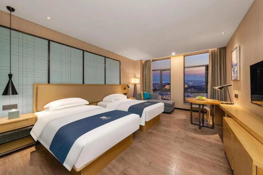 Bed in Echarm Hotel Guangzhou Tonghe Dayuan Times Square