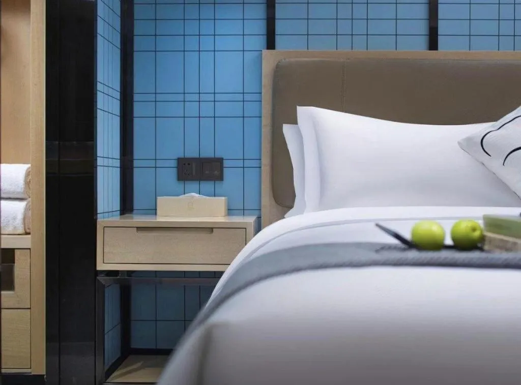 Bed in Echarm Hotel Guangzhou Tonghe Dayuan Times Square