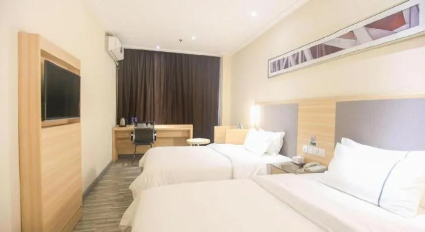 Bed in City Comfort Inn Guangzhou Tianhe District Tangxia Exhibition Center