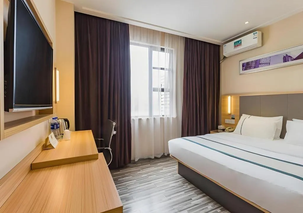 Bed in City Comfort Inn Guangzhou Tianhe District Tangxia Exhibition Center