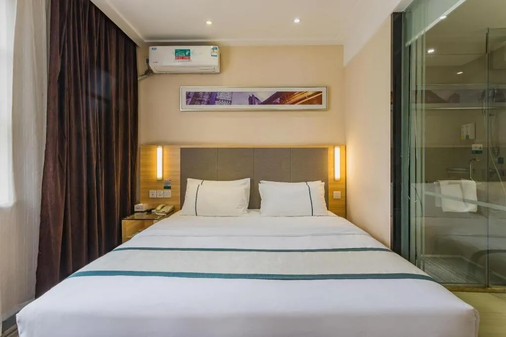 Bed in City Comfort Inn Guangzhou Tianhe District Tangxia Exhibition Center